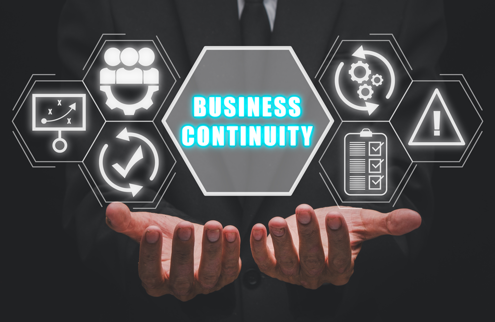 business-continuity-concept-businessman-hand-holding-business-continuity-icon-virtual-screen